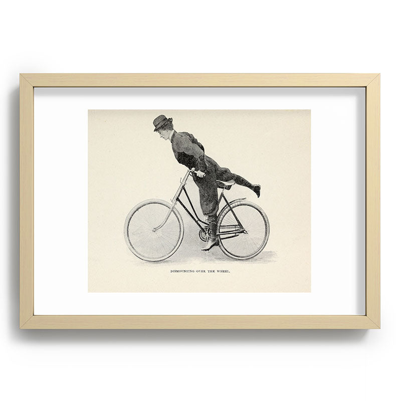 "Dismounting Over the Wheel" from "Bicycling for Ladies" by Maria E. Ward, 1896 Framed Art Print