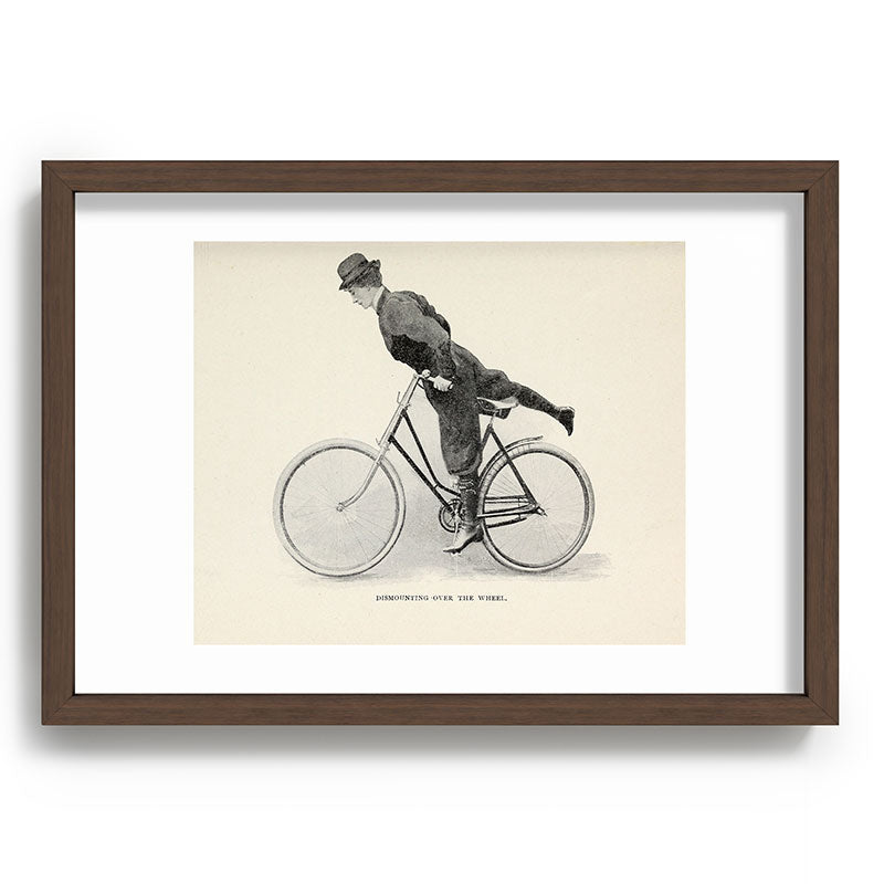 "Dismounting Over the Wheel" from "Bicycling for Ladies" by Maria E. Ward, 1896 Framed Art Print