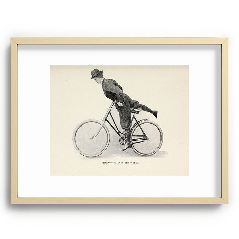 "Dismounting Over the Wheel" from "Bicycling for Ladies" by Maria E. Ward, 1896 Framed Art Print