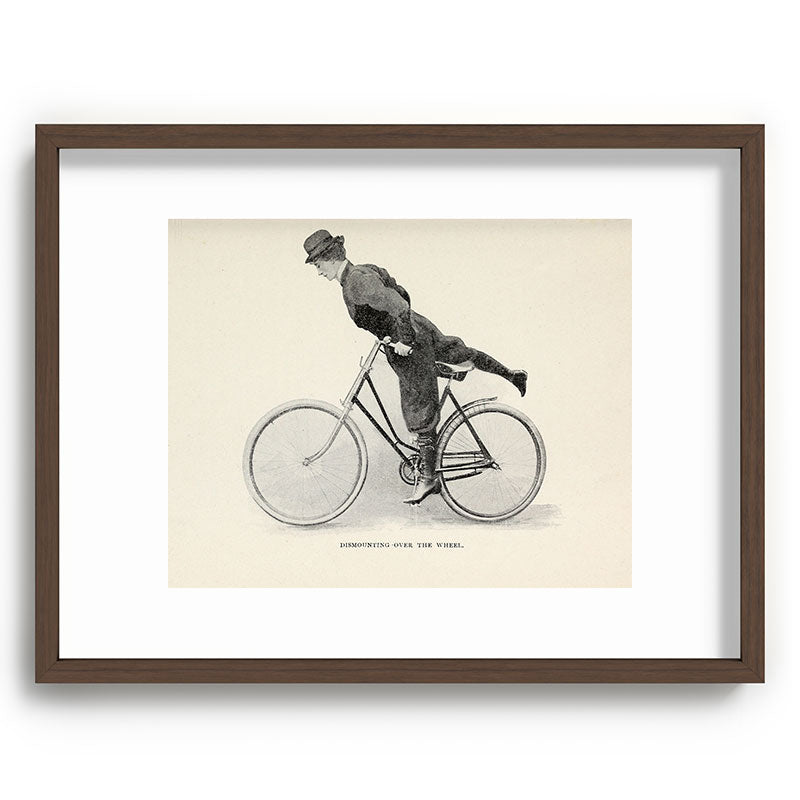 "Dismounting Over the Wheel" from "Bicycling for Ladies" by Maria E. Ward, 1896 Framed Art Print