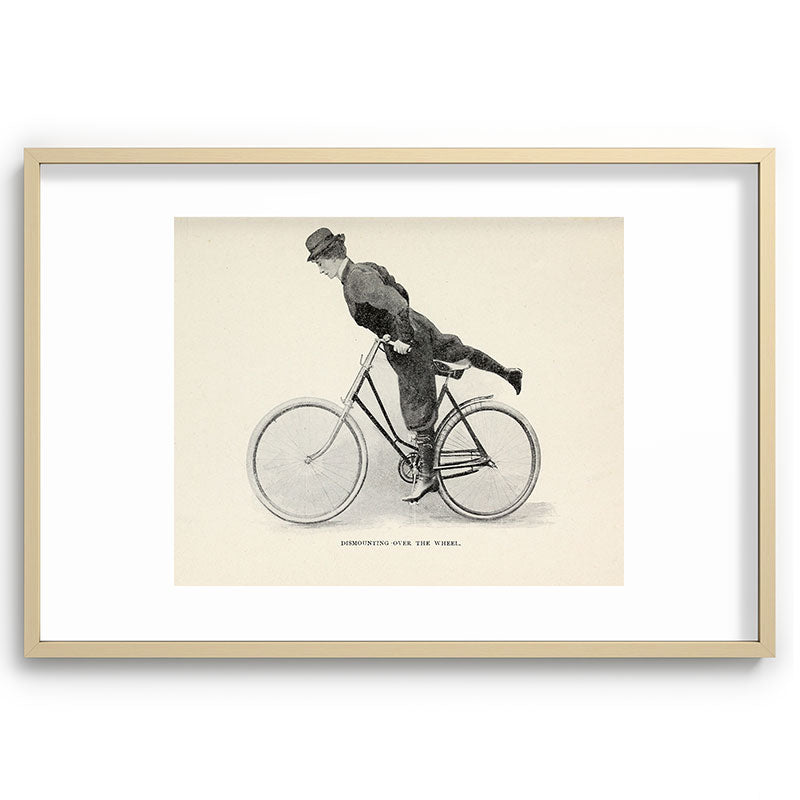 "Dismounting Over the Wheel" from "Bicycling for Ladies" by Maria E. Ward, 1896 Framed Art Print