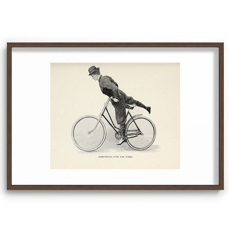"Dismounting Over the Wheel" from "Bicycling for Ladies" by Maria E. Ward, 1896 Framed Art Print