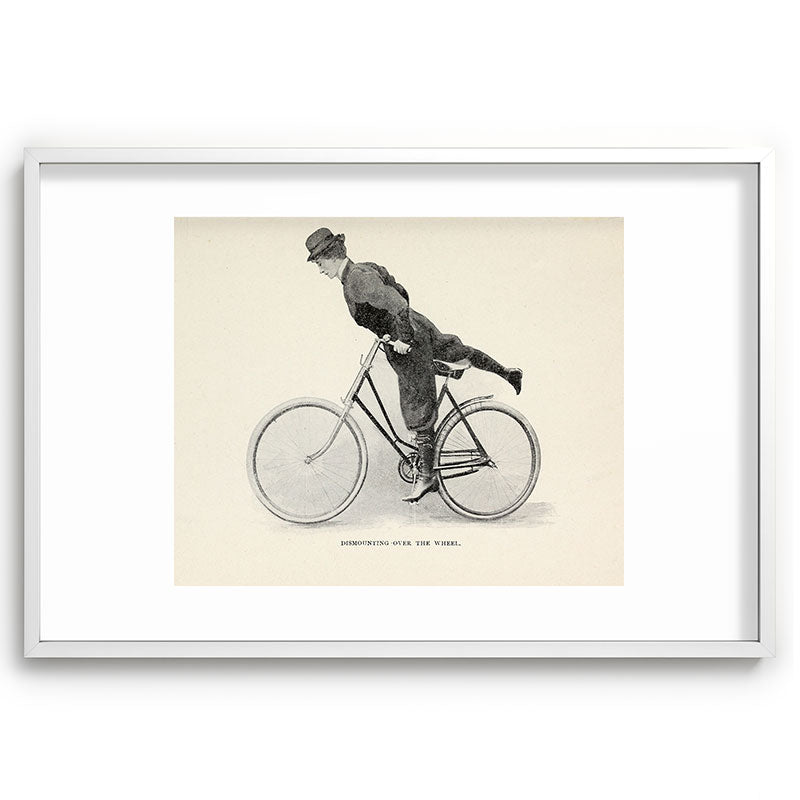 "Dismounting Over the Wheel" from "Bicycling for Ladies" by Maria E. Ward, 1896 Framed Art Print