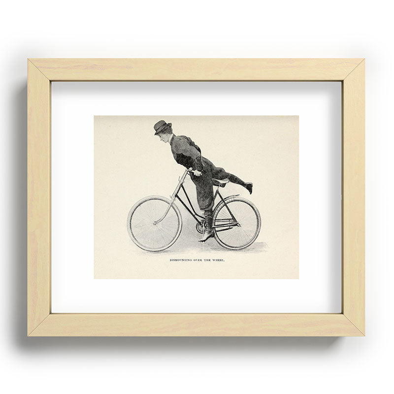 "Dismounting Over the Wheel" from "Bicycling for Ladies" by Maria E. Ward, 1896 Framed Art Print