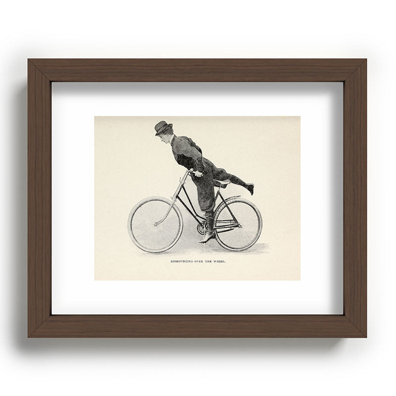 "Dismounting Over the Wheel" from "Bicycling for Ladies" by Maria E. Ward, 1896 Framed Art Print