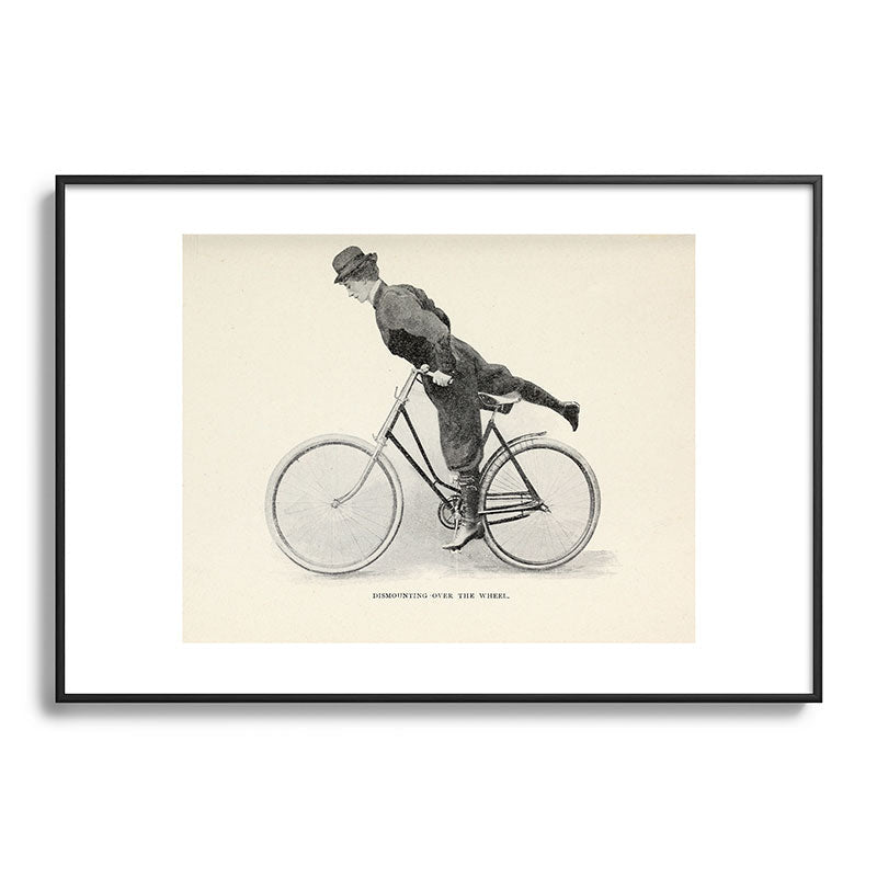 "Dismounting Over the Wheel" from "Bicycling for Ladies" by Maria E. Ward, 1896 Framed Art Print