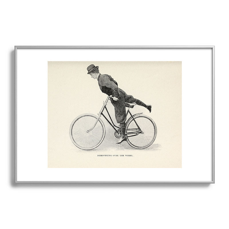 "Dismounting Over the Wheel" from "Bicycling for Ladies" by Maria E. Ward, 1896 Framed Art Print