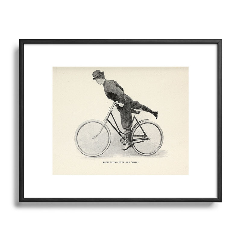 "Dismounting Over the Wheel" from "Bicycling for Ladies" by Maria E. Ward, 1896 Framed Art Print