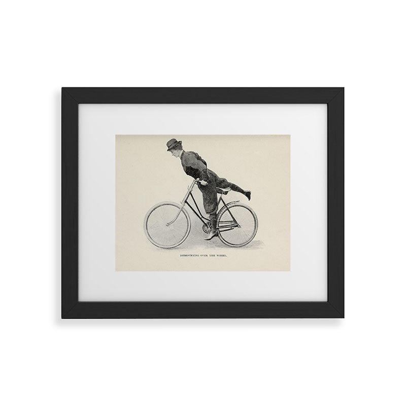 "Dismounting Over the Wheel" from "Bicycling for Ladies" by Maria E. Ward, 1896 Framed Art Print