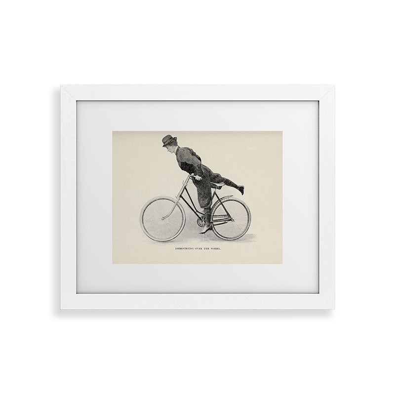 "Dismounting Over the Wheel" from "Bicycling for Ladies" by Maria E. Ward, 1896 Framed Art Print
