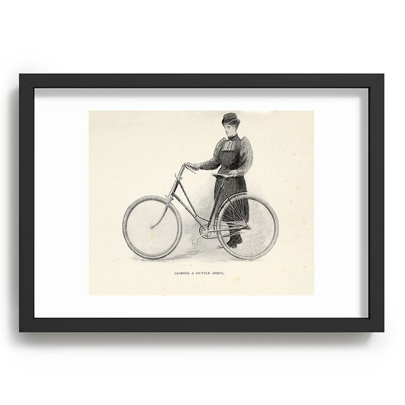 "Leading a Bicycle About" from "Bicycling for Ladies" by Maria E. Ward, 1896 Framed Art Print