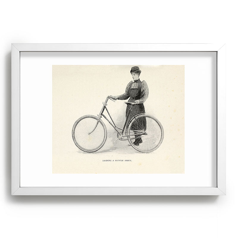 "Leading a Bicycle About" from "Bicycling for Ladies" by Maria E. Ward, 1896 Framed Art Print