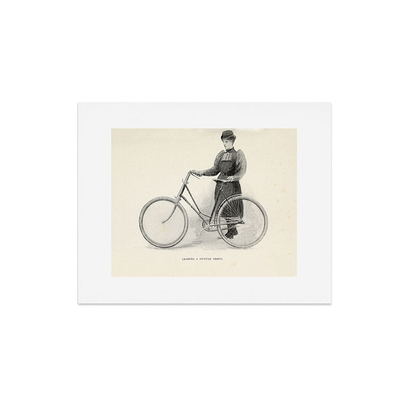 "Leading a Bicycle About" from "Bicycling for Ladies" by Maria E. Ward, 1896 Art Print