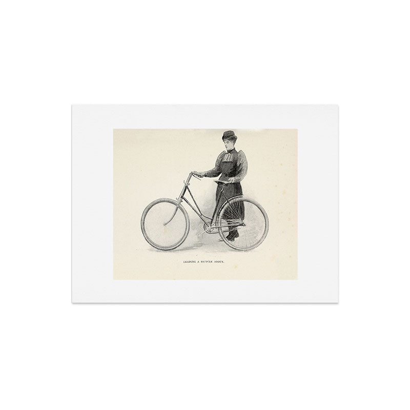 "Leading a Bicycle About" from "Bicycling for Ladies" by Maria E. Ward, 1896 Art Print