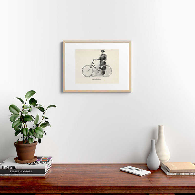"Leading a Bicycle About" from "Bicycling for Ladies" by Maria E. Ward, 1896 Framed Art Print