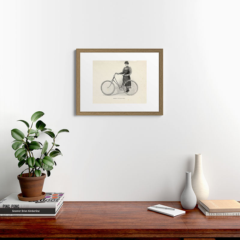 "Leading a Bicycle About" from "Bicycling for Ladies" by Maria E. Ward, 1896 Framed Art Print
