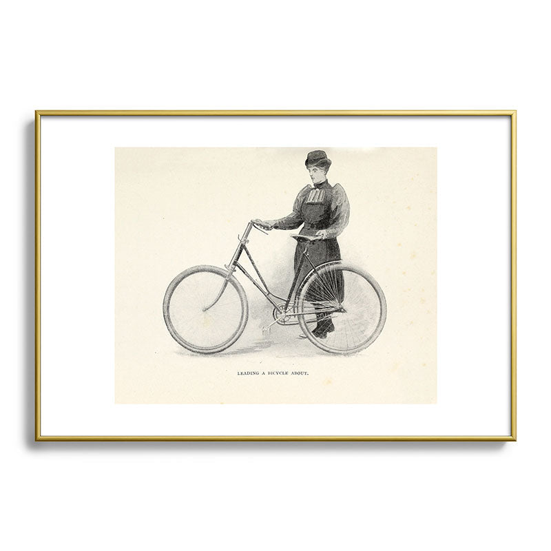 "Leading a Bicycle About" from "Bicycling for Ladies" by Maria E. Ward, 1896 Framed Art Print