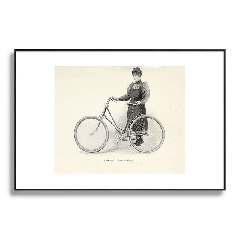 "Leading a Bicycle About" from "Bicycling for Ladies" by Maria E. Ward, 1896 Framed Art Print