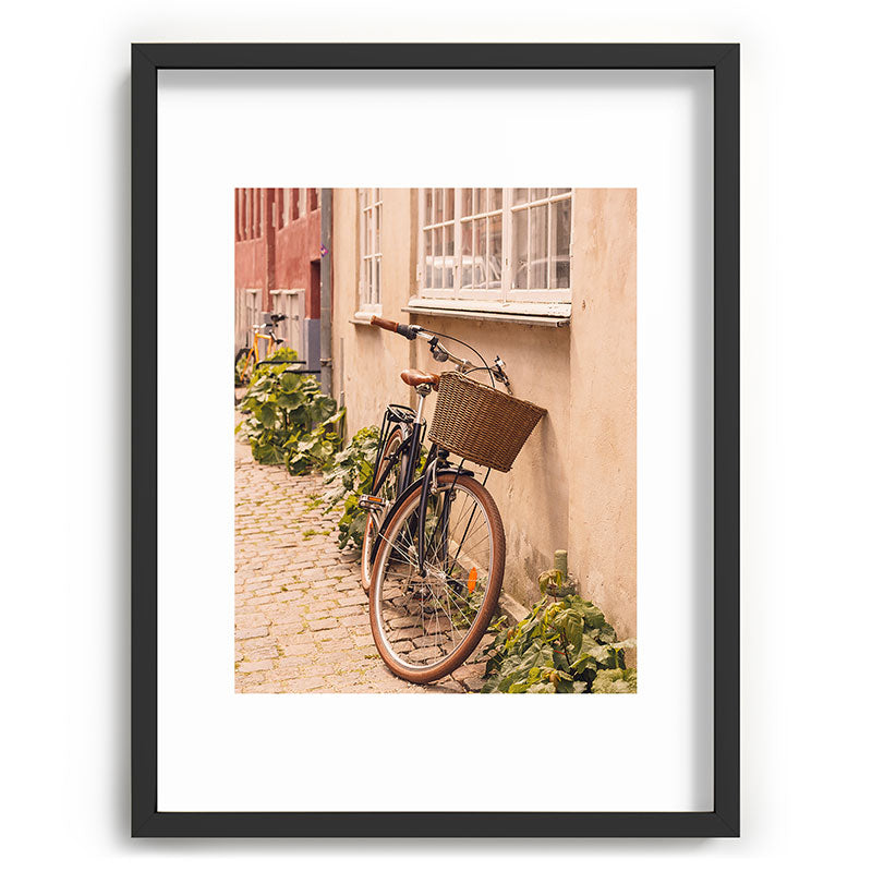 A bicycle in a Copenhagen street | Travel photography | Scandi Europe Scandinavia  Framed Art Print