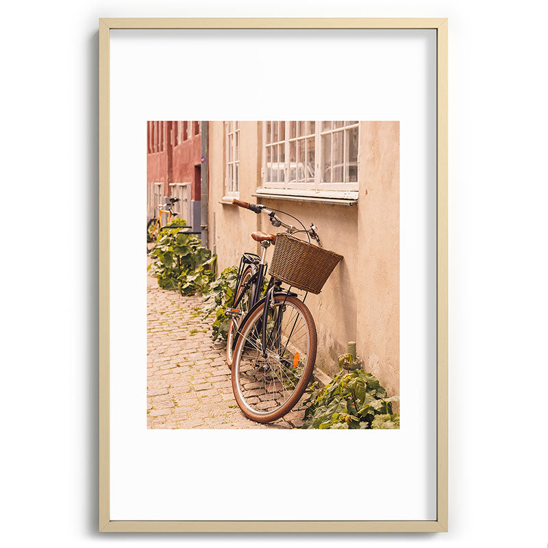 A bicycle in a Copenhagen street | Travel photography | Scandi Europe Scandinavia  Framed Art Print