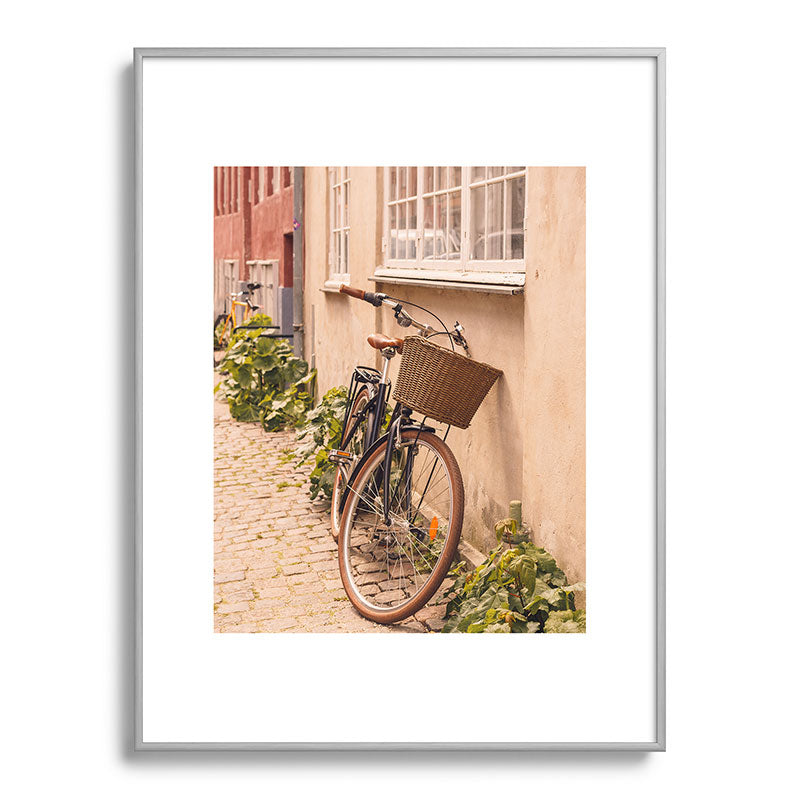 A bicycle in a Copenhagen street | Travel photography | Scandi Europe Scandinavia  Framed Art Print