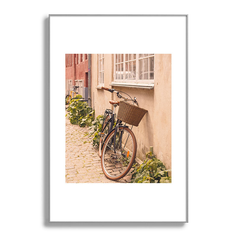 A bicycle in a Copenhagen street | Travel photography | Scandi Europe Scandinavia  Framed Art Print