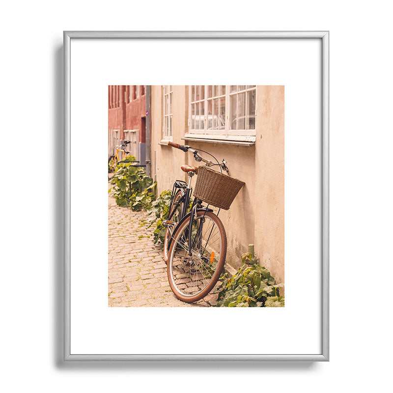 A bicycle in a Copenhagen street | Travel photography | Scandi Europe Scandinavia  Framed Art Print