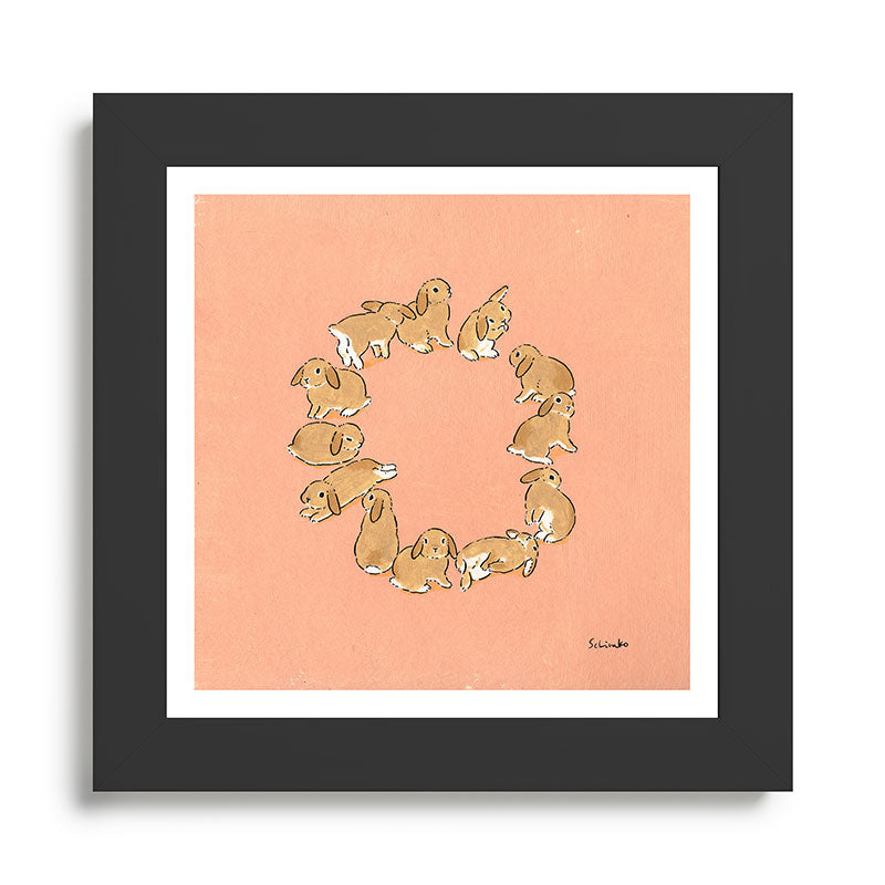 12 lop rabbits Framed Art Print