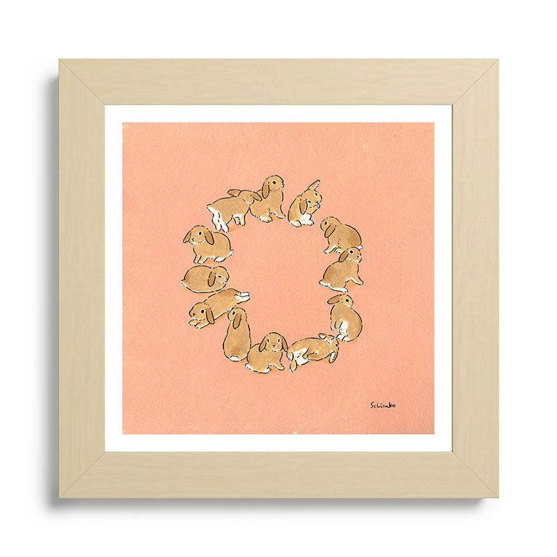 12 lop rabbits Framed Art Print