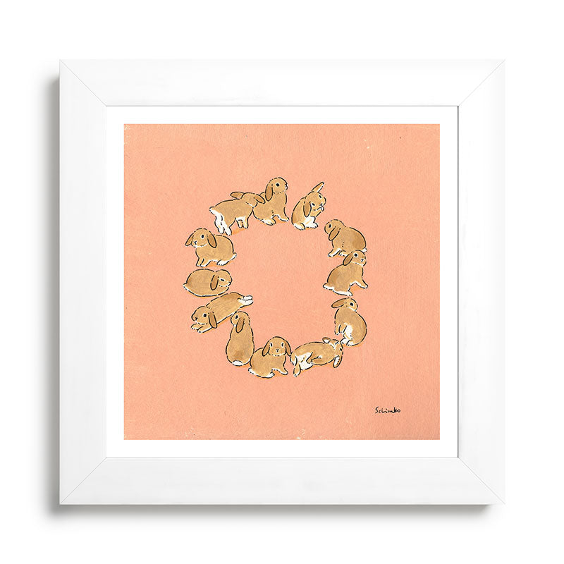 12 lop rabbits Framed Art Print