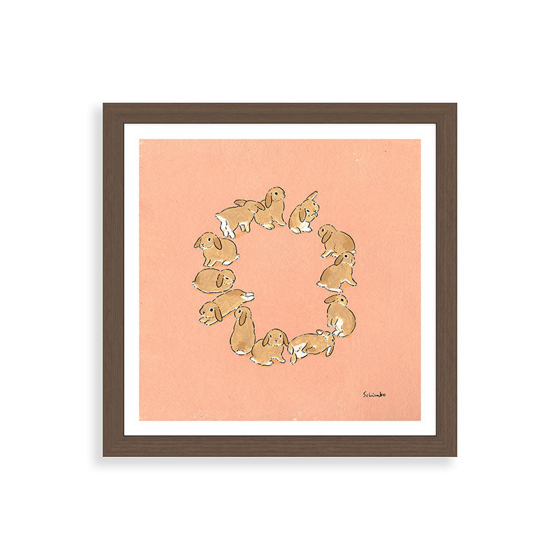 12 lop rabbits Framed Art Print