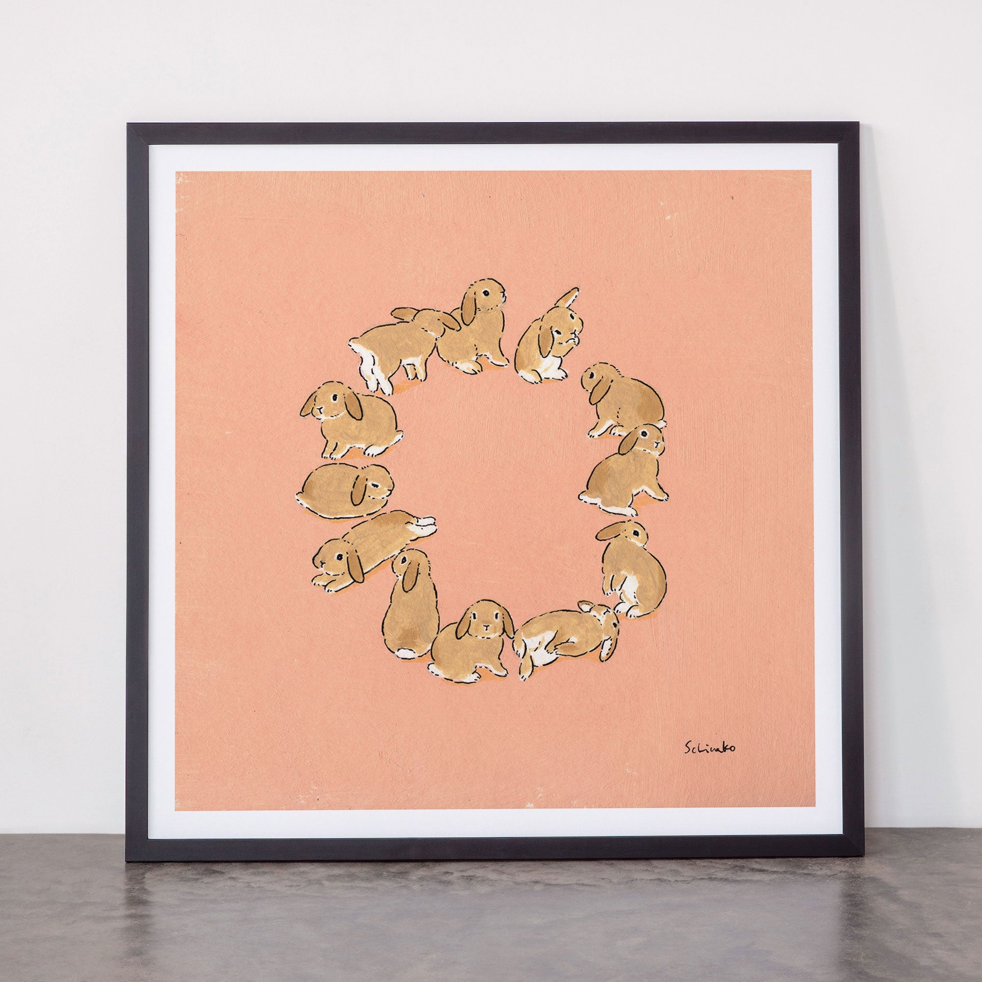 12 lop rabbits Framed Art Print