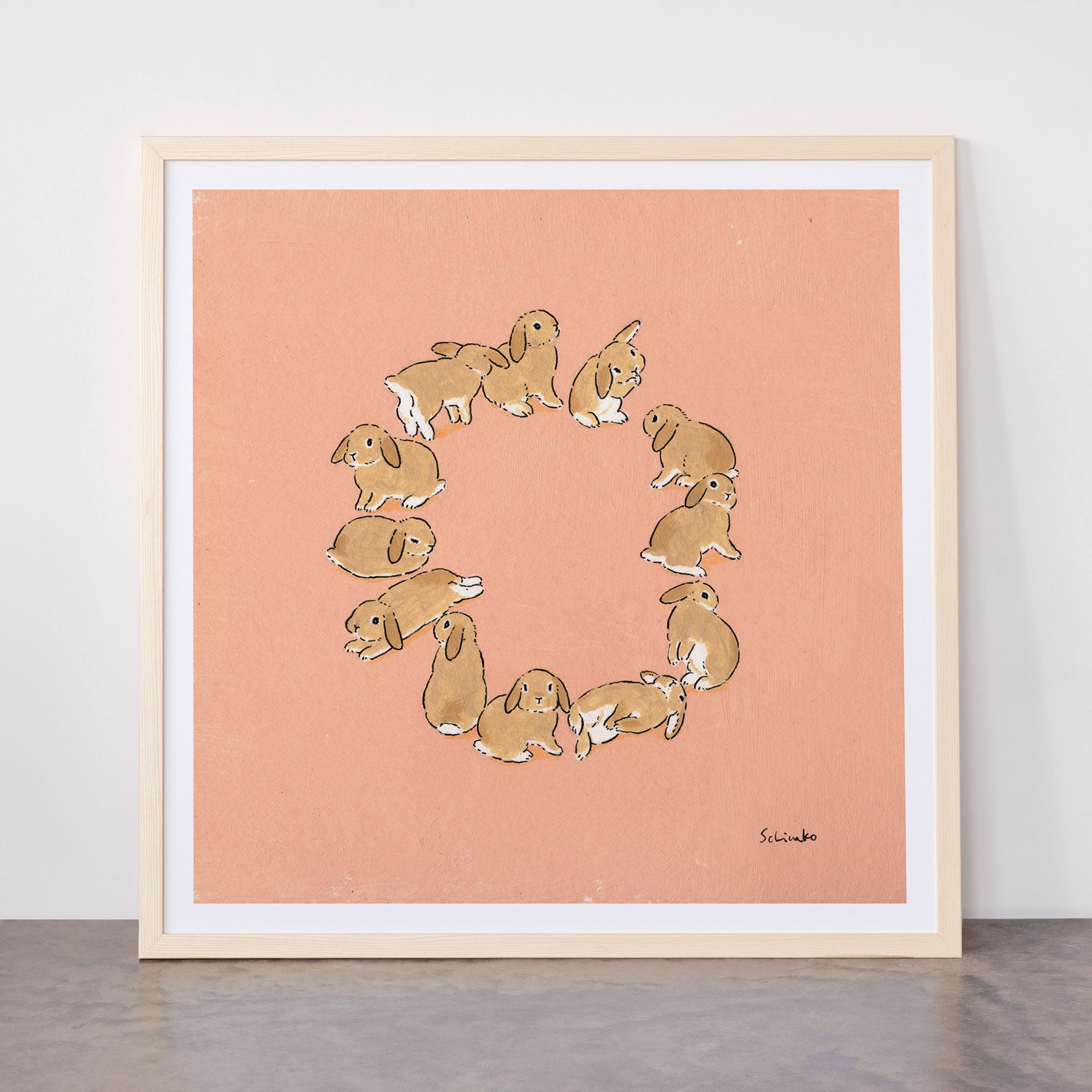 12 lop rabbits Framed Art Print