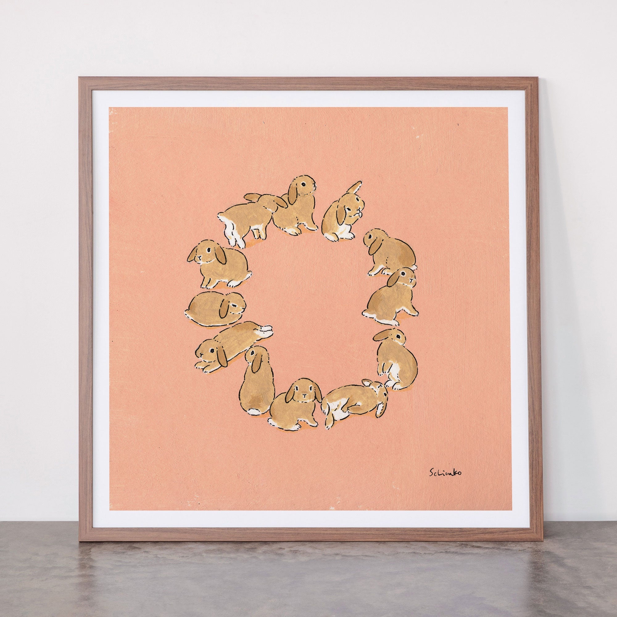 12 lop rabbits Framed Art Print