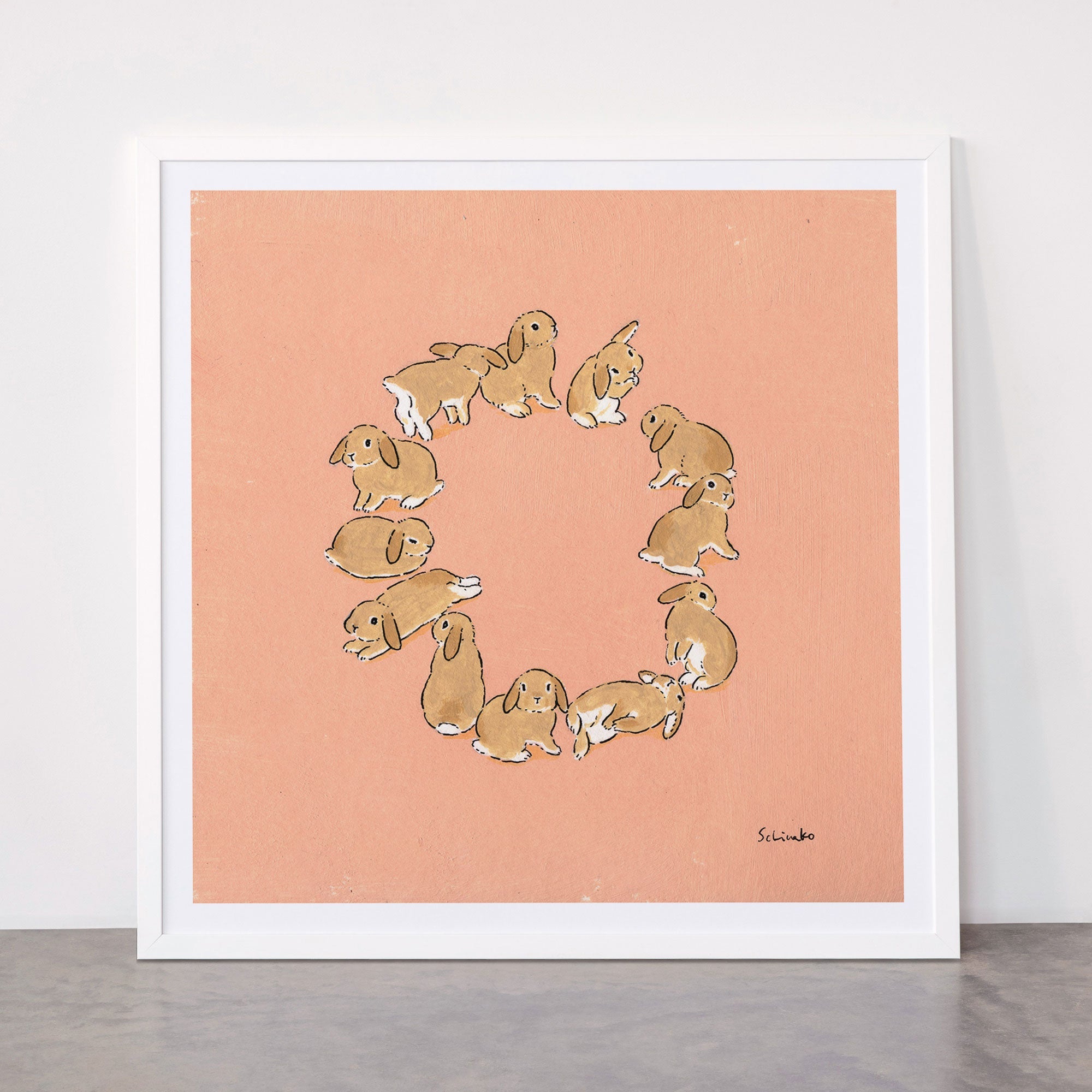 12 lop rabbits Framed Art Print