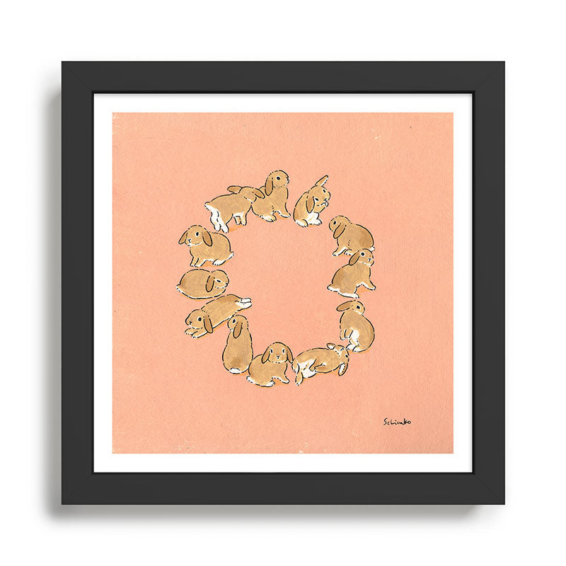 12 lop rabbits Framed Art Print