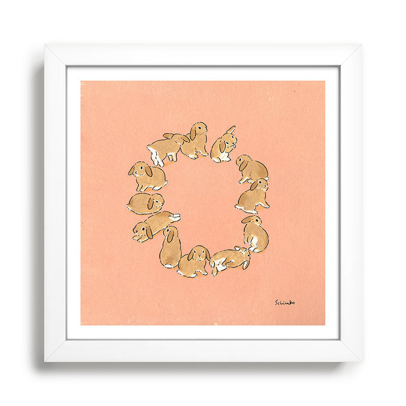 12 lop rabbits Framed Art Print