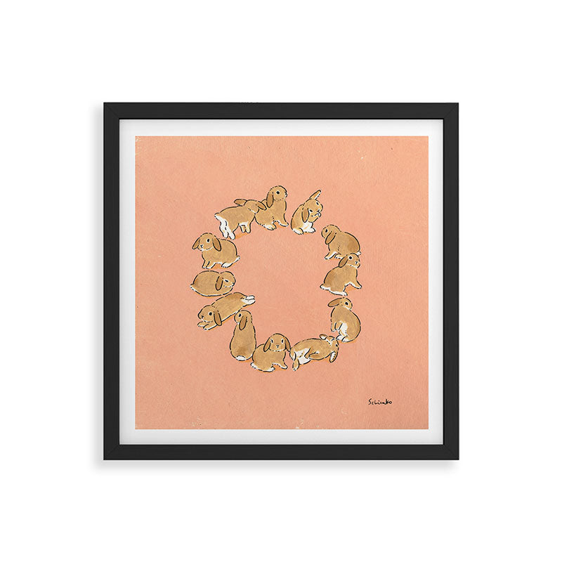 12 lop rabbits Framed Art Print