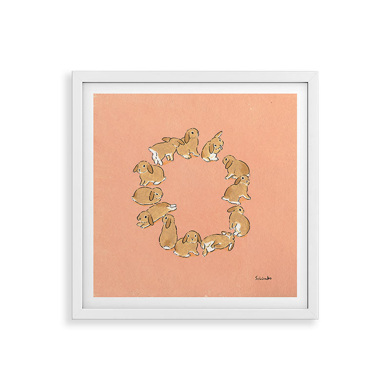 12 lop rabbits Framed Art Print