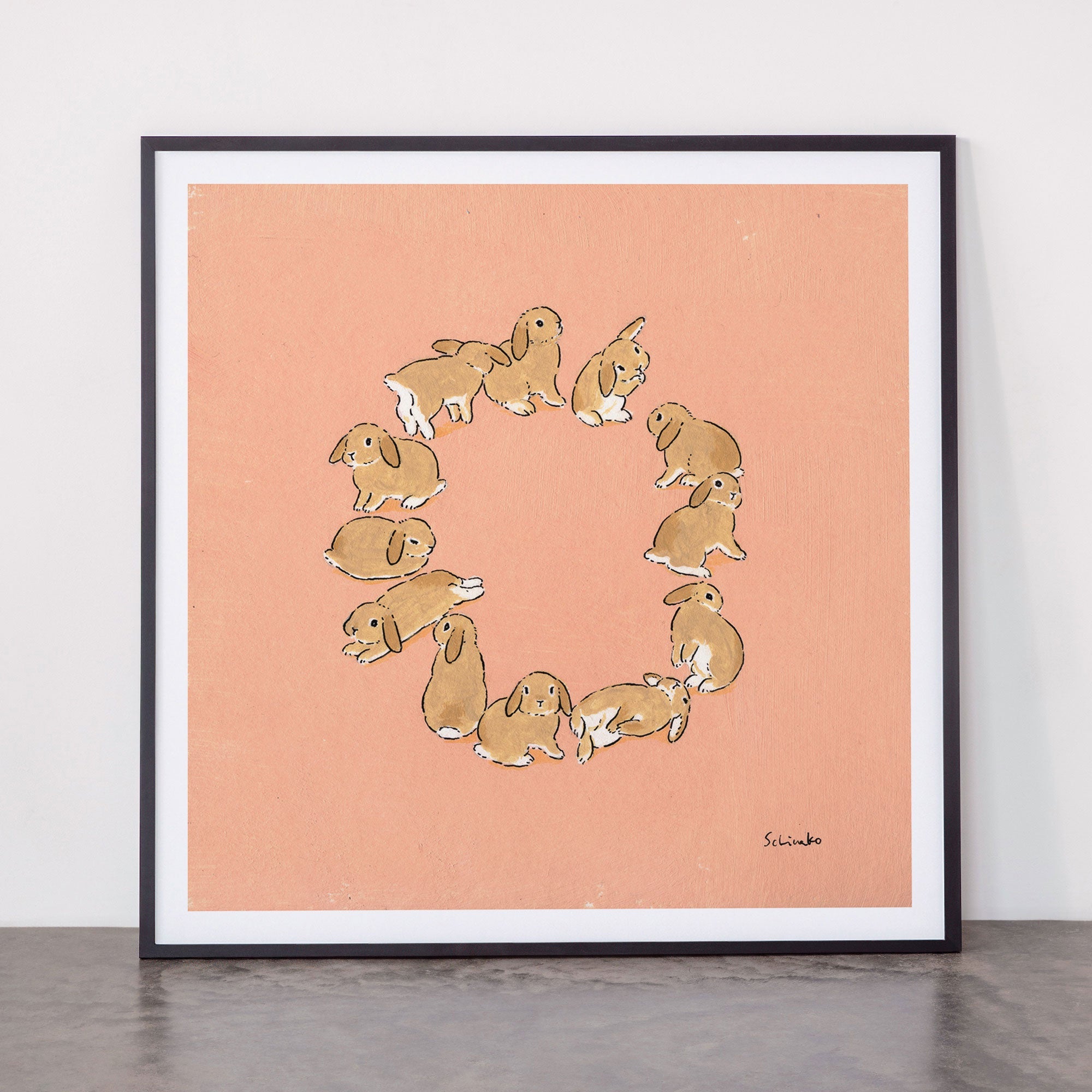 12 lop rabbits Framed Art Print