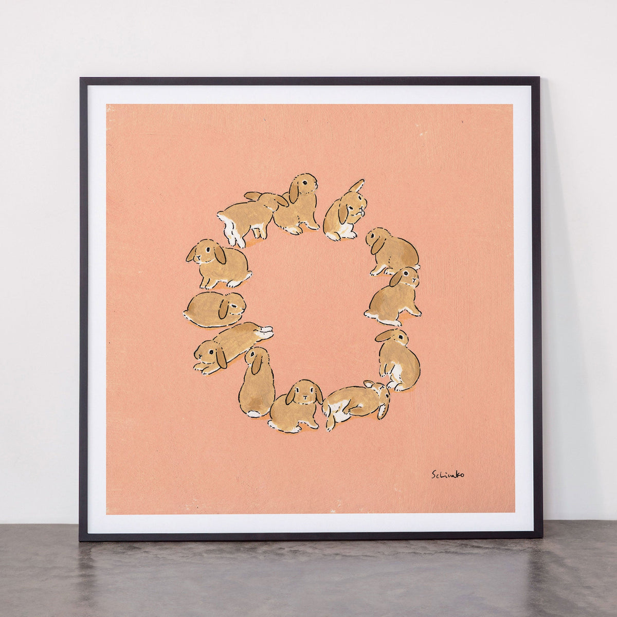 12 lop rabbits Framed Art Print