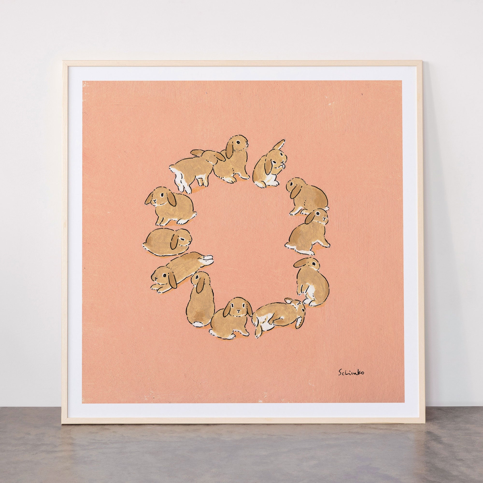 12 lop rabbits Framed Art Print