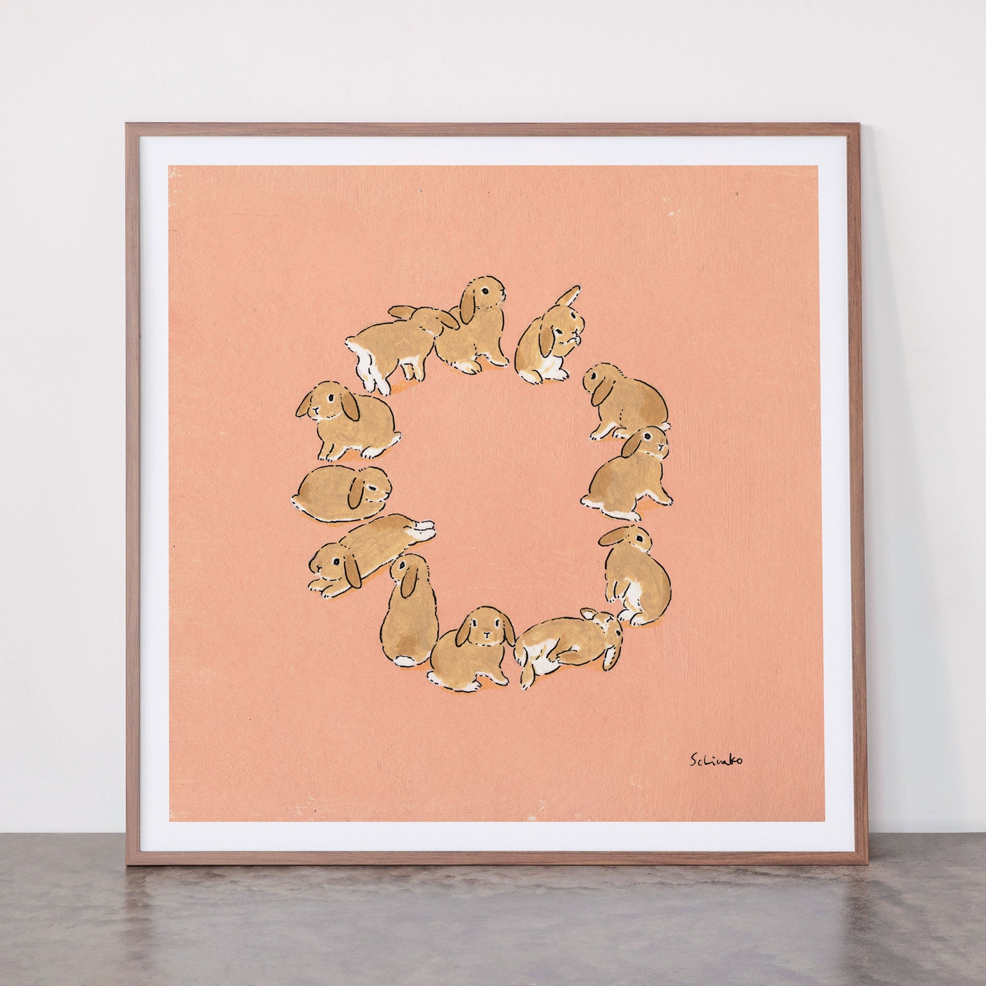 12 lop rabbits Framed Art Print