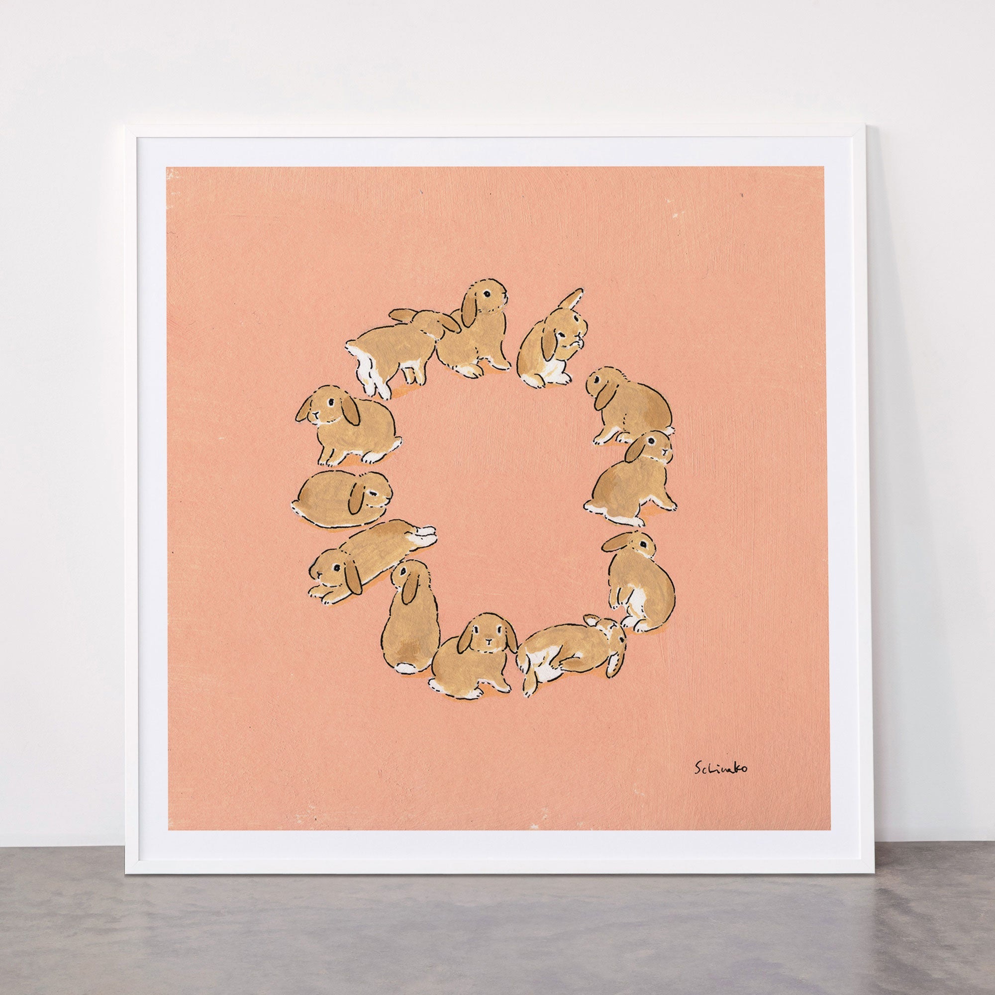 12 lop rabbits Framed Art Print