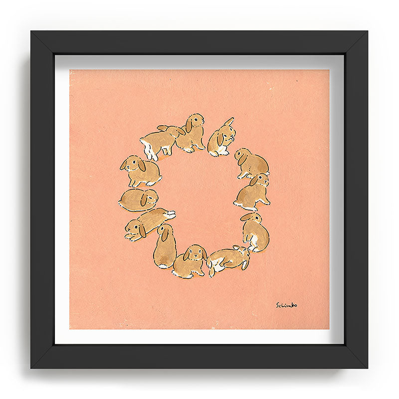 12 lop rabbits Framed Art Print
