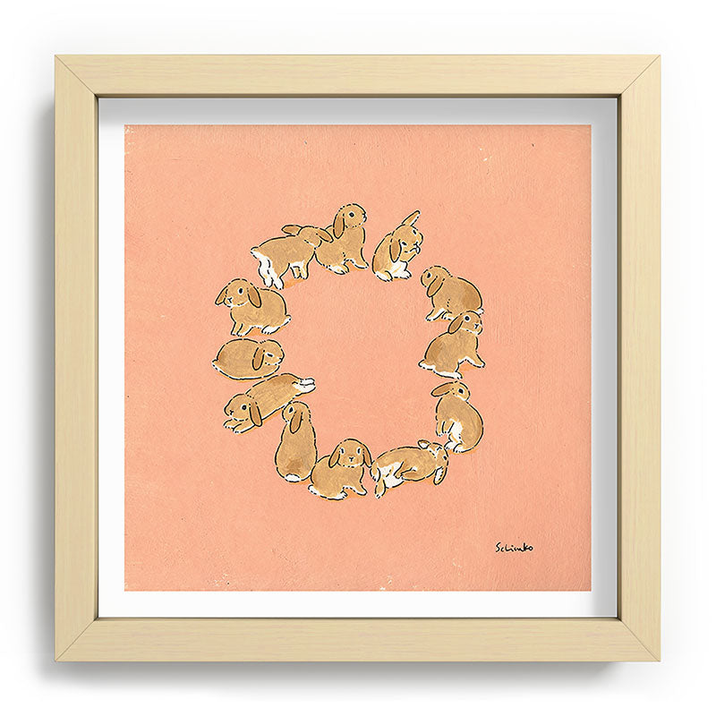 12 lop rabbits Framed Art Print