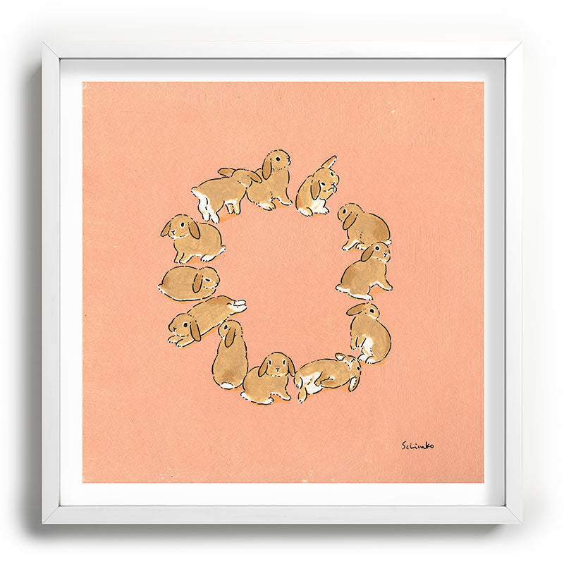 12 lop rabbits Framed Art Print