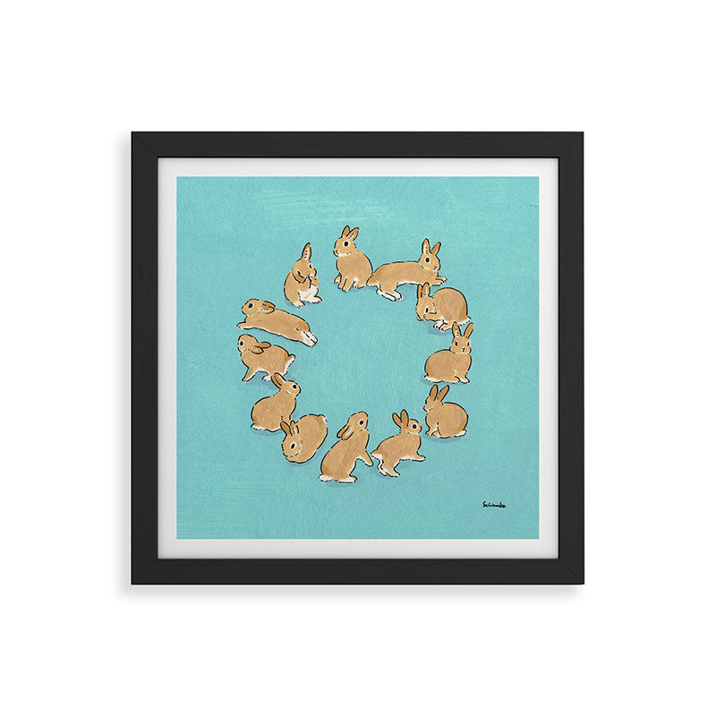 12 rabbits Framed Art Print