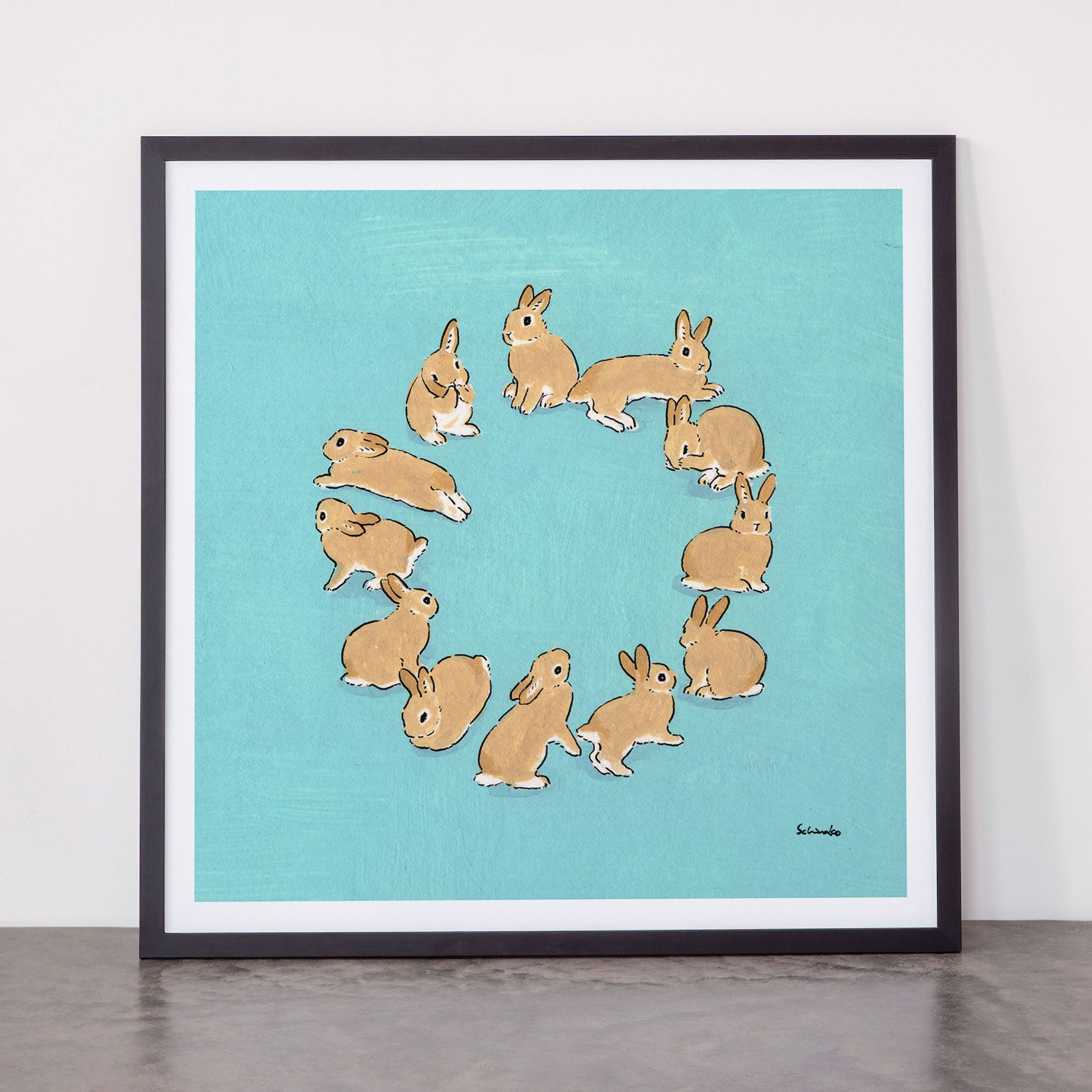 12 rabbits Framed Art Print
