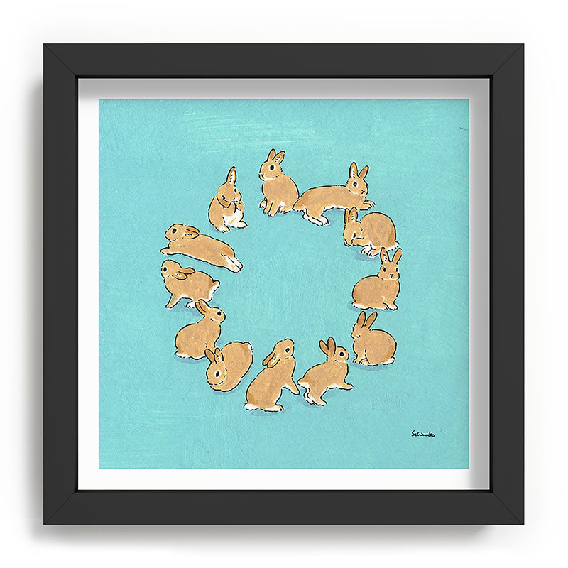 12 rabbits Framed Art Print